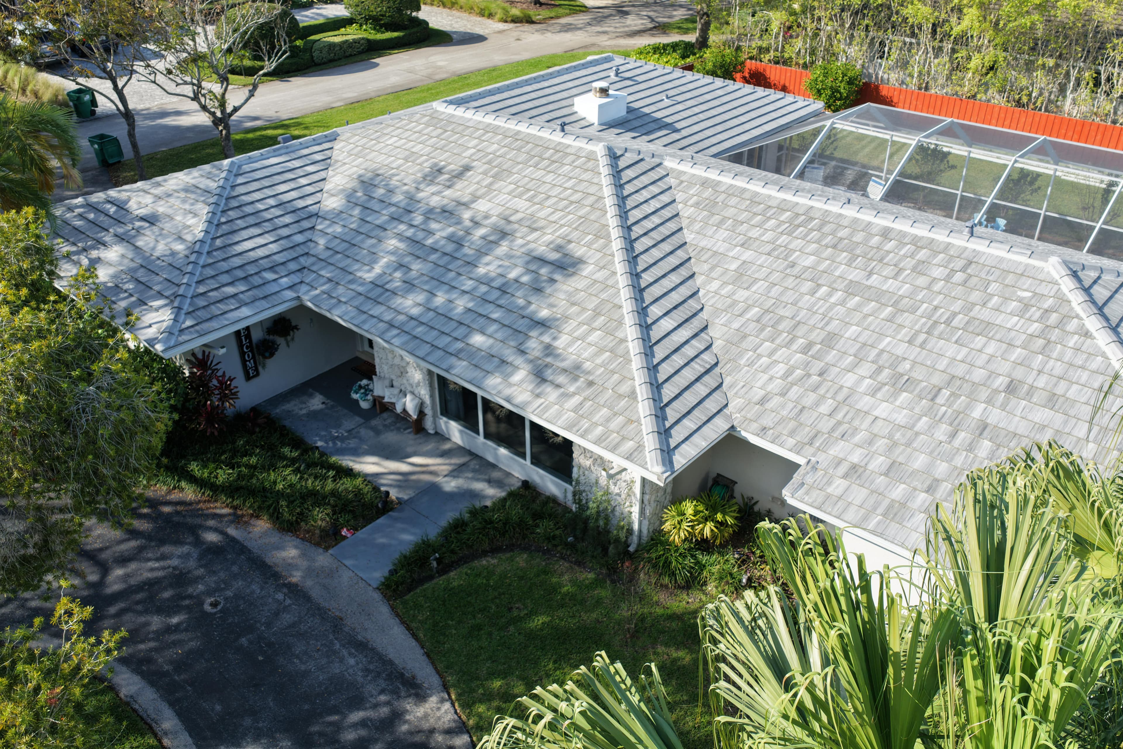 Residential roof replacement by T&S Roofing Systems in Miami — new tile and shingle roofing installation